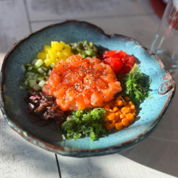 a plate of food in a blue bowl